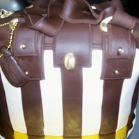 Coach Purse A friends 30th b-day party cake. Her colors was brown and cream. She wanted a unique coach purse. This is what I came up with. And her...