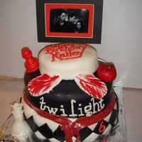Twilight Saga Cake I incorporated the whole saga on this cake. All things were made with fondant, cake covered in fondant, the picture at the top though is...