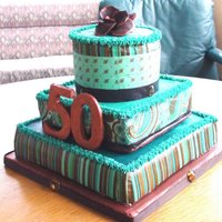 50Th Birthday Bottom layer is strawberry buttercream, middle layer is chocolate genache and the top layer is vanilla buttercream. It was hard to get a...