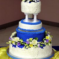 Blue And Yellow Wedding This is one of my favorite wedding cakes I have done. This is mainly due to the clients. They gave me the colour scheme and flower...
