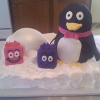Club Penguin Birthday Cake I used the stand up bear pan and carved it and covered it in fondant to make the penguin. The igloo is the half ball pan and the little...