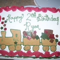 Train For My Nephew This train cake was for my nephew, It was fun to make and my kids helped out cutting out the fondant shapes!!