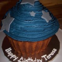 Giant Dallas Cowboys Cupcake I made this for my sister who loves the Dallas Cowboys... She loved it and It made me happy!!