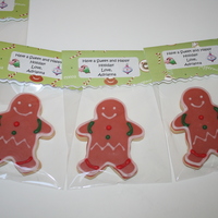 Gingerbread Boy Cookies sugar cookies covered and decorated with glace.