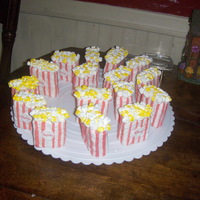 Popcorn Boxes these are rkt covered in fondant topped with mini marshmallows hand painted yell
