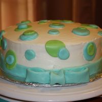 Blue/green Fondant Cake This was my first experience with marshmallow fondant. I was pretty pleased with the way it turned out.
