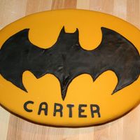 Batman Signal This is my first fondant covered cake. First time working with fondant period actually. It was for my son's 5th birthday party.