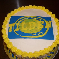 Que's Reunion Cake This cake is for a mini class reunion from Tilden HS in Chicago, IL. The cake is 1/2 DDCSC and 1/2 WASC and frosted with buttercream. The...