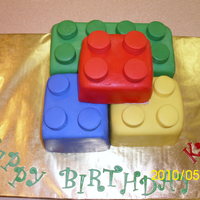 Kyle's Lego Birthday Cake WASC white and chocolate covered with fondant. Had never done a square cake with fondant before so it was a learning experience! Needless...