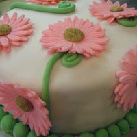 Daisies For Daisy WASC with chocolate buttercream. Leftover flowers from cupcakes. Inspiration came from others on CC.