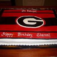 Georgia Bulldogs GA Bulldog sheet cake for a coworker's birthday. Iced in BC, fondant on top.