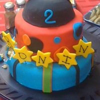 Mickey Hat The classic Micky hat! Hat is gluten free cake with cookies covered in fondant for the ears! I got the picture after my nephew, the...