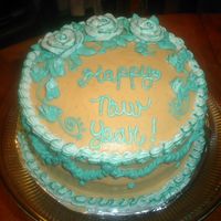 Sany0021.jpg Orange cake with Orange flavored cream cheese. (my second cake at home on my own, frosting was too soft! )