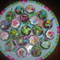 Sany0077.jpg Brownie bites I made and decorated for my Easter dessert buffet. Buttercream frosting