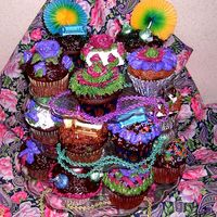 Hpim0637-1.jpg Just some "I'm Bored" cupcakes! (I needed to practice for my job) Chocolate cupcake w/chocolate fudge frosting and...