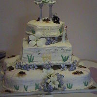 Beach Themed Wedding Cake This was made for my friend's daughter's wedding. She wanted lillies and the dark shading on the corners was brown sugar sand...