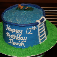 Pool These. Layered cake with butter cream and a fondant character. This was supposed to be Wilton's checker cake but it didn't quite turn...