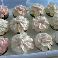 Flower Cupcakes. I was surfing the web for a fun flower to put on top of my cupcakes. These are supposed to be begonias, taste testers said dogwood blossoms...