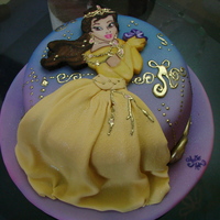 Golden Belle Handpainted Belle. Airbrushed background. Fondant/Gum paste dress.