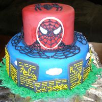 Spider Man Blue and red Spider Man cake with a city scape.