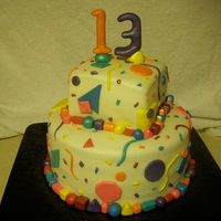 Geometric Cake fondant cake with geometric shapes. very colorful