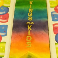Kings Kids Cake Several cakes put together to make this big ribbon. It resembles on of the ribbons the children receive as a reward. Every year we...