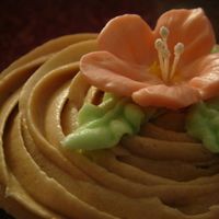 Dsc03208.jpg chocolate cupcake with chocolate buttercream icing...royal icing flower