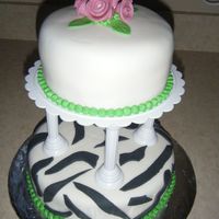 Wilton Course 3 Final The bottom is 9" red velvet cake w/ cc frosting & the top is a 6" spice cake w/ cc frosting.