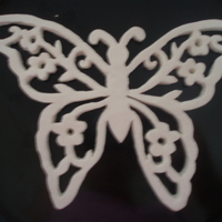 White Modeling Chocolate Butterfly If you are interested how I made this, there is a tutorial on make your own mold in the forum right here on CC http://cakecentral.com/cake-...