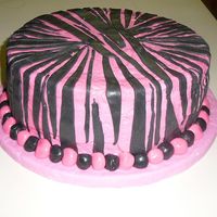 1St Zebra Cake This was my first time using the WASC recipe (awesome!!!) and the rolled buttercream fondant. I had a hard time with the pink fondant...