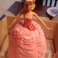 Princess Cake Princess cake with a real Barbie. Chocolate cake with pink buttercream frosting.