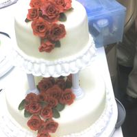 Class 3 Final Cake This was my final cake for Wilton's Course 3. It was the first time using that kind of tiers, fondant roses and that border. I was...