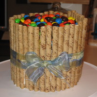 Cookie Cake Yellow cake with BC. Spiral wafer cookies and topped with M&M's and Junior Mints - my sisters favorite candy! Thanks to CC for all...