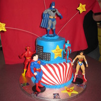 The Justice League Buttercream with fondant accents