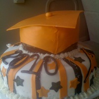 High School Graduation Cake Fondant covered cake with fondant accents. The cap was fondant also