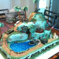 Army Men Cake This is a multi-layer cake that a friend (hollylikescake) and I made. It is covered in buttercream and airbrushed. The water is made with...
