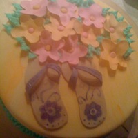 Flip Flops And Flowers Fondant coverd with fondant accents.