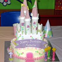 Castle Cake Made for my girl 3rd bday. Special thanks to msauer for ideas and guidance. Cake cover with buttercream. Walls and towers from fondant.