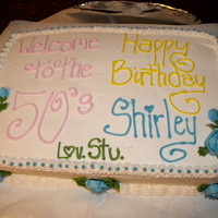 Rainbow Sheet Cake Vanilla sheet cake but rainbow inside. Done in all butter cream.