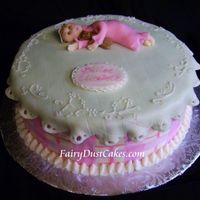 Ruffles And Plaid Baby Shower Cake This round cake is iced in buttercream in which I painted with pink food coloring. The top of the cake is covered with a blanket of fondant...