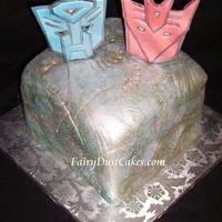 Transformers Allspark Cake This cake is made for my son. It is 8"x8"x8" and covered with fondant. The designs were made with various gumpaste tools and...