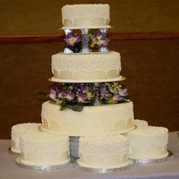 Wilton Desgin White Cake This was my first large cake :) im so happy with how it came out it was all buttercream. The cake was strawberry with strawberry cream...