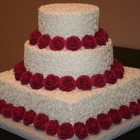 Cornelli Lace With Roses Buttercream cornelli lace with royal icing roses. (6R, 9R, 12SQ). WASC with strawberry cream filling. Middle tier is chocolate with...
