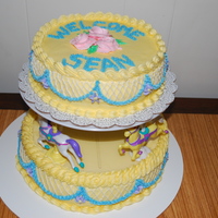 Carousel Baby Shower Cake I made this cake using a Wilton Carousel Horse seperator set. Top cake is a 10 inch lemon cake with lemon curd filling and iced in...