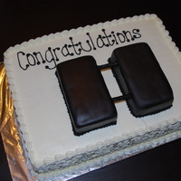 Army Cpt Promotion Cake Buttercream icing except for Captain Bars covered in Black fondant.