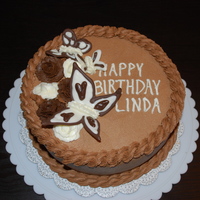 Butterfly Cake This cake is double chocolate with raspberry filling iced in chocolate buttercream. Roses are dark and white chocolate buttercream. The...