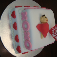 Valentine's Day Themed Baby Shower Cake 10in and 8in square cakes with fondant decorations.