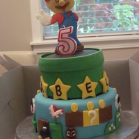 Super Marios Bros Cake I copied this cake from another member on here. Everyone loved it!! Thanks for your design!! 10in and 8in covered in fondant.