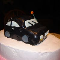 Daddy's Ride I made this cake just for practice. I really had a lot of fun. the cake is frosted with whip cream frosting and the car is covered in...