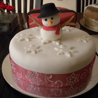 Snowman Cake This is a cake for fund raising. I made 3 of them. It's simple so it didn't take long!